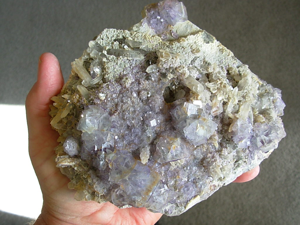 Clear to Lilac Purple Cubic Fluorite with Hematite Inclusions from China