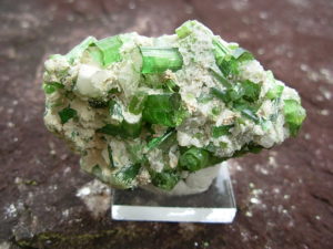 Cluster of Green Tourmaline Crystals on Quartz Matrix