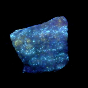 Fluorescent 15 Chondrodite and Diopside on Calcite